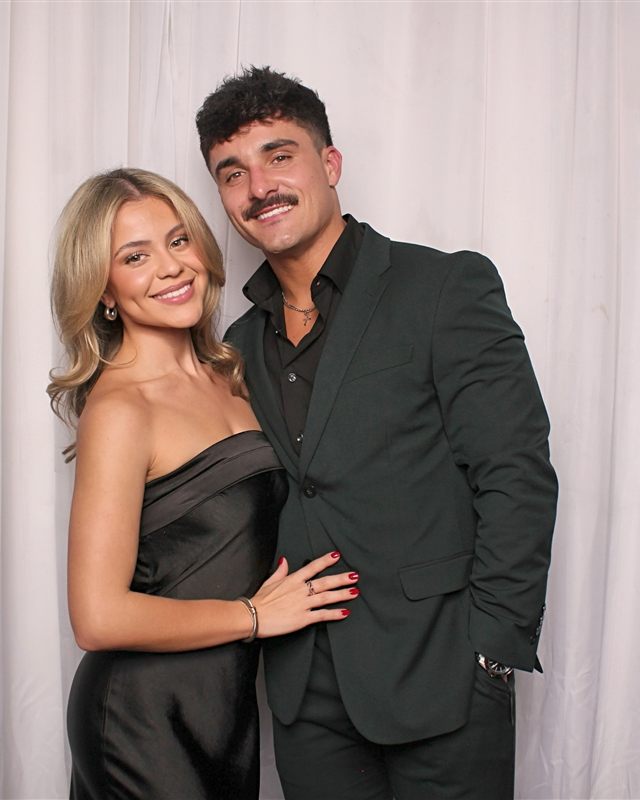 Hunter and his girlfriend Natalia dressed up for an event