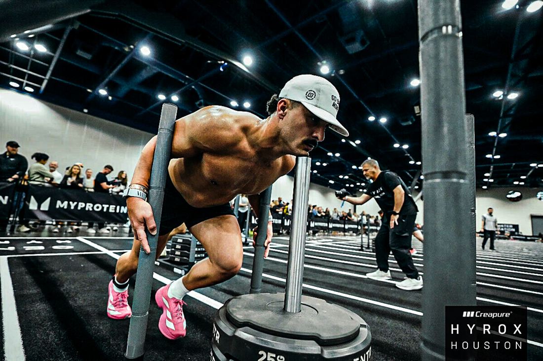 Hunter pushing the sled at Hyrox Houston