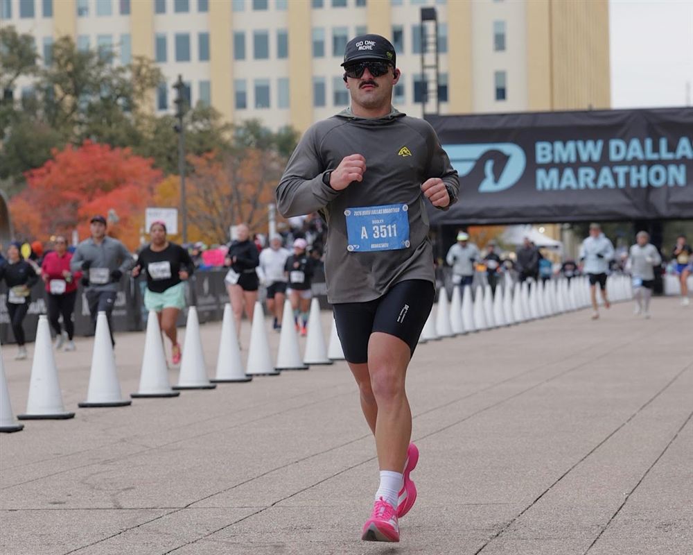 Hunter running the finish stretch of the BMW Dallas Marathon