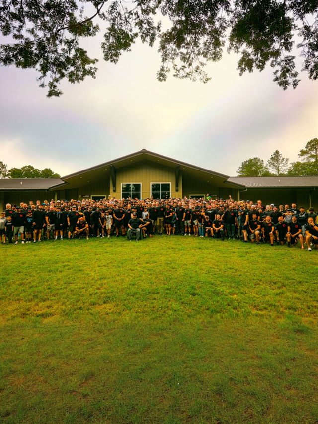 Group photo of the men at Mighty Men Camp 2026